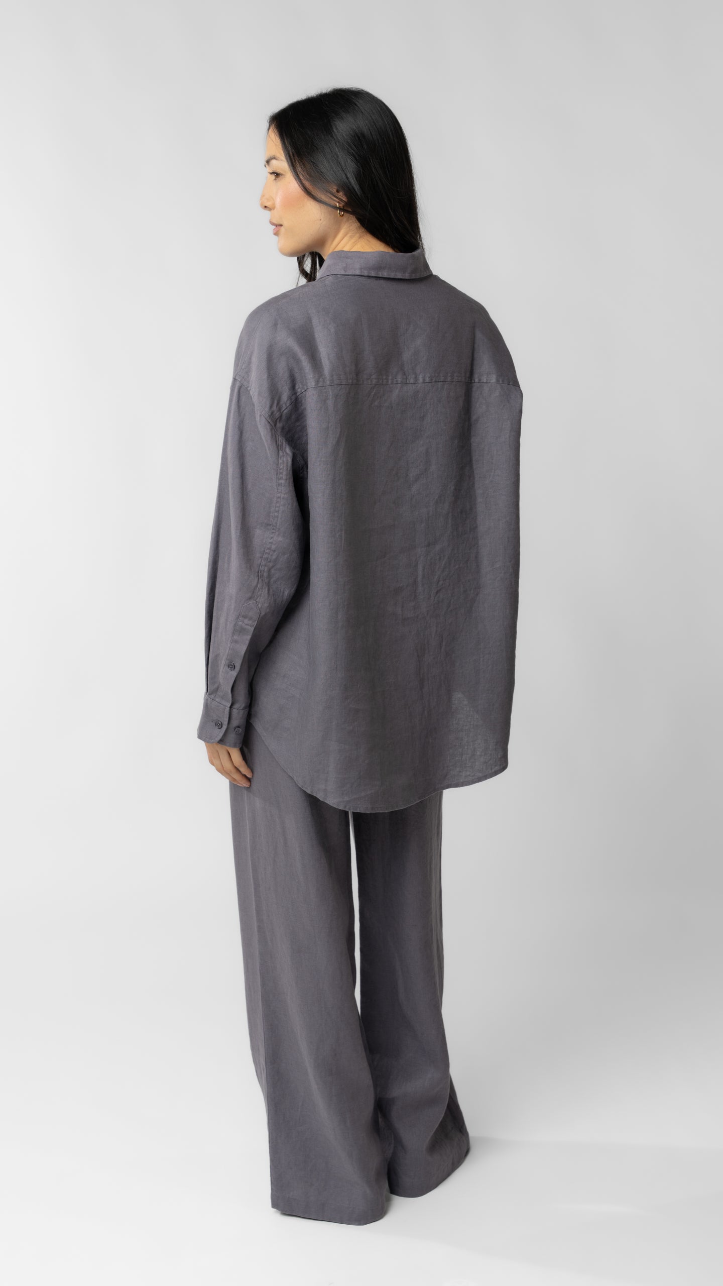 women wearing linen shirt and pants in purple