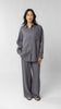 women wearing linen shirt and pants in purple