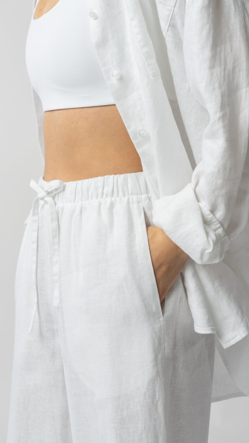 model wearing linen top and pants in white