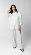 women wearing white linen pants
