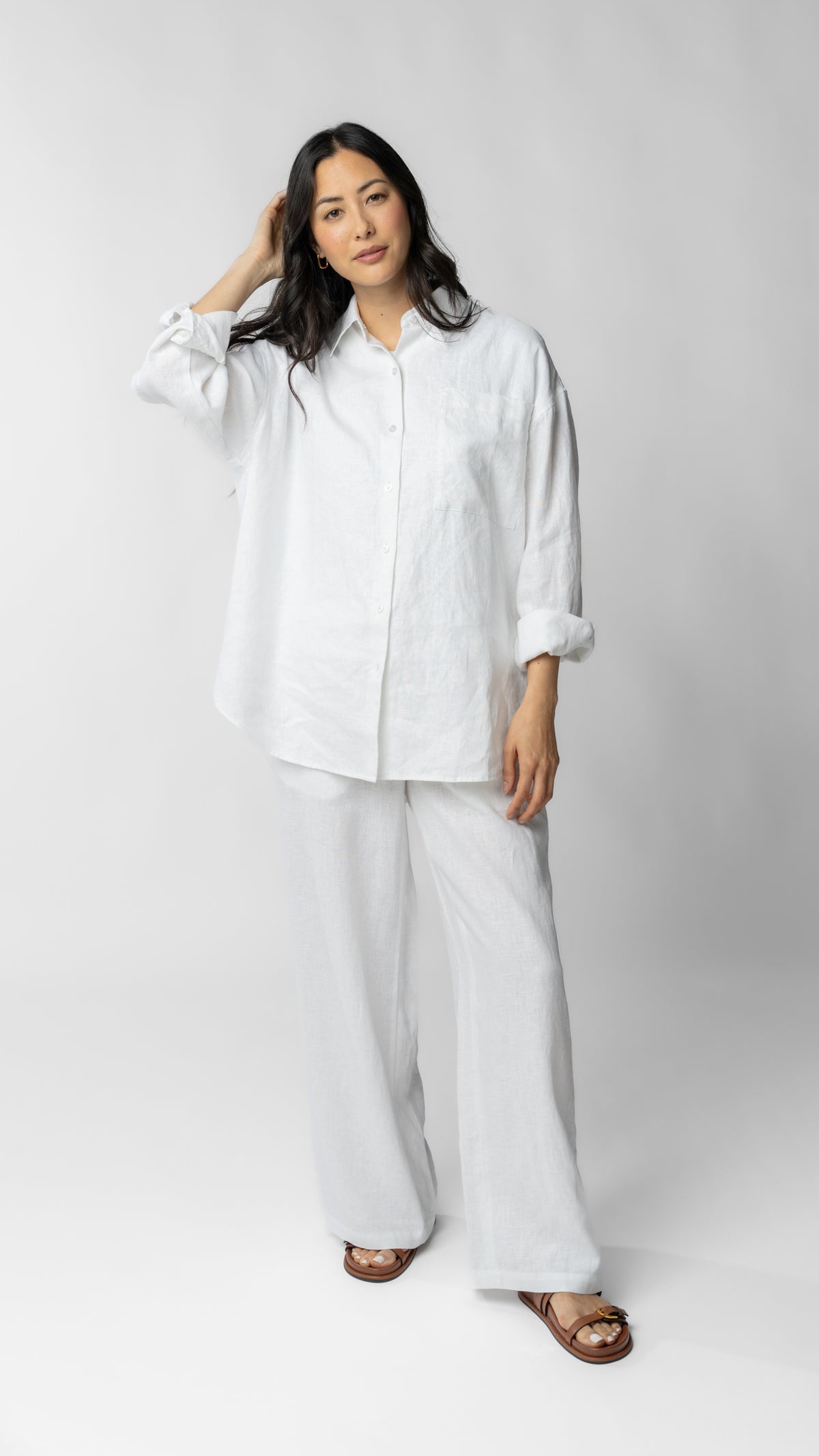 women wearing white linen pants