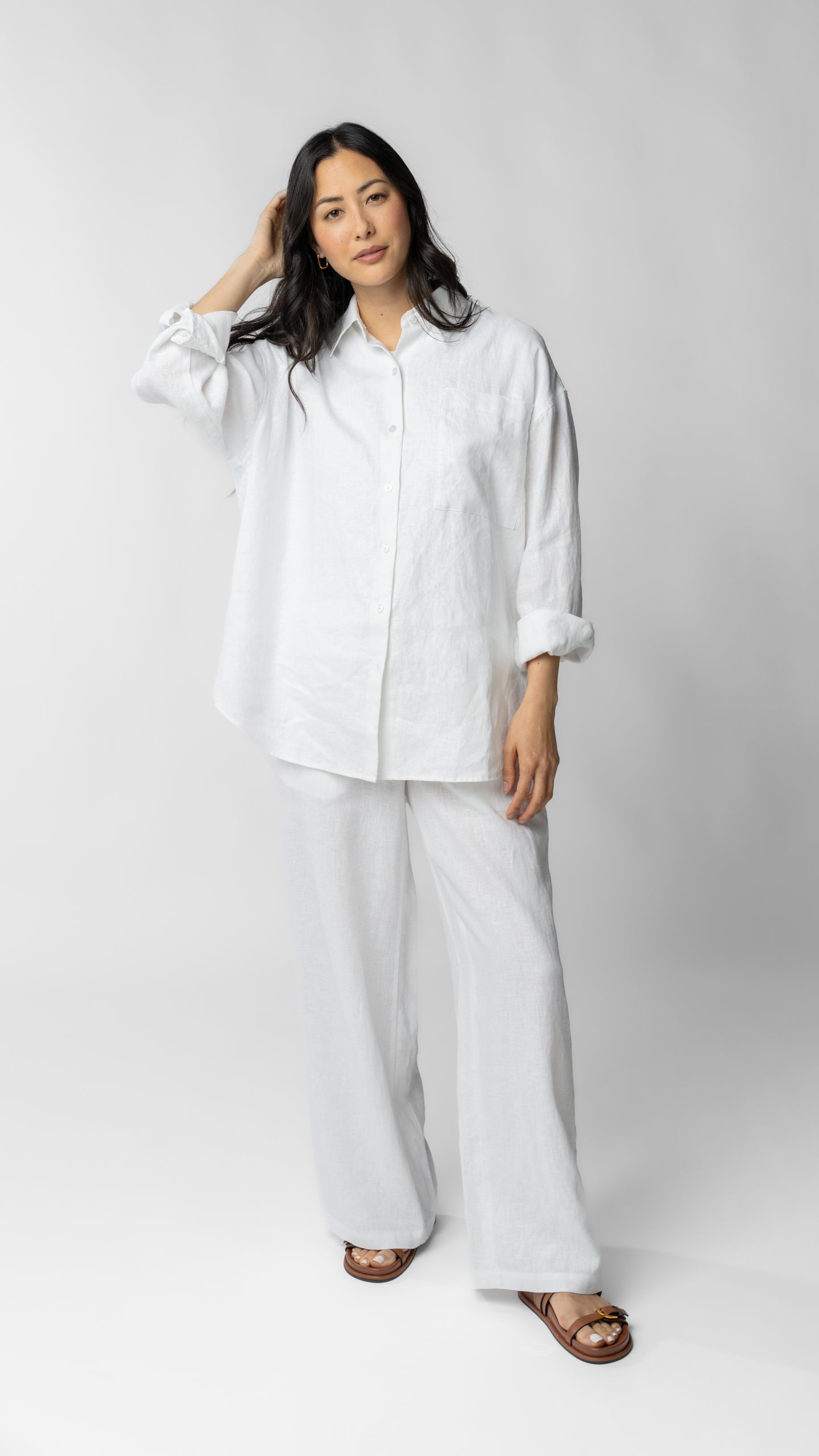 women wearing white linen pants