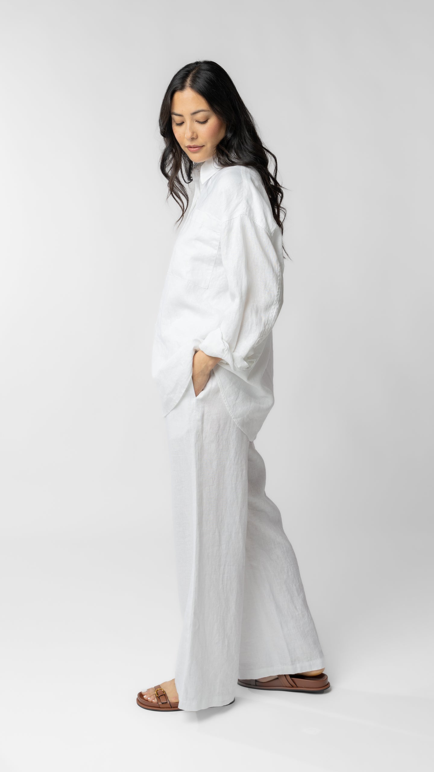 women wearing white linen pants