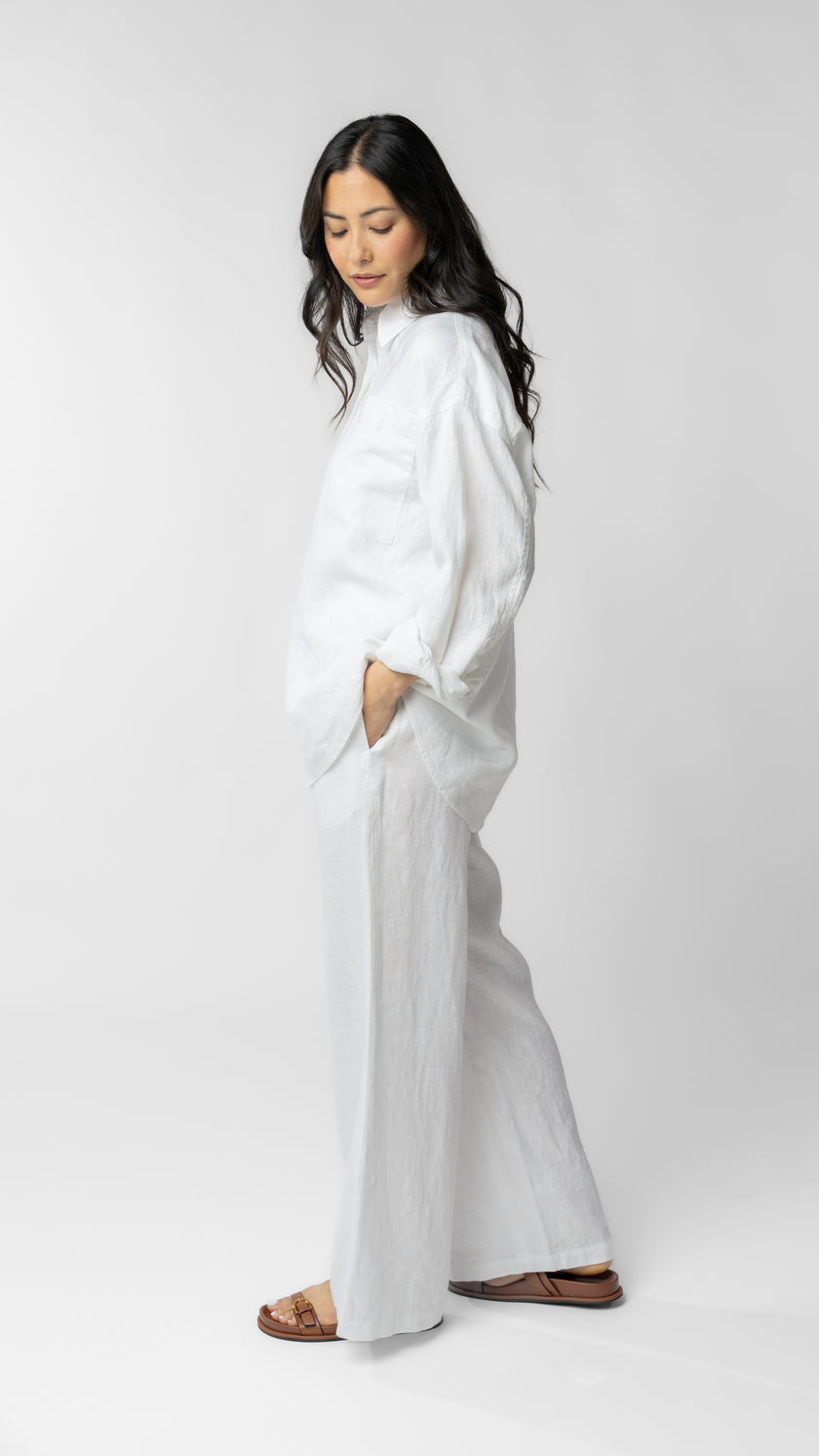 women wearing white linen pants
