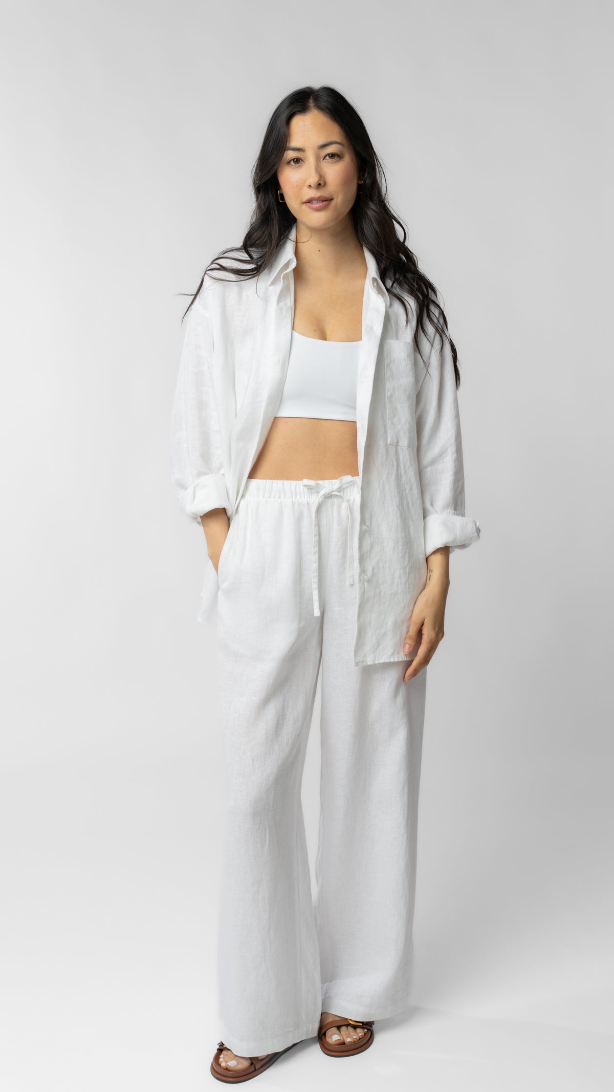 women wearing white linen pants
