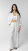 women wearing white linen pants