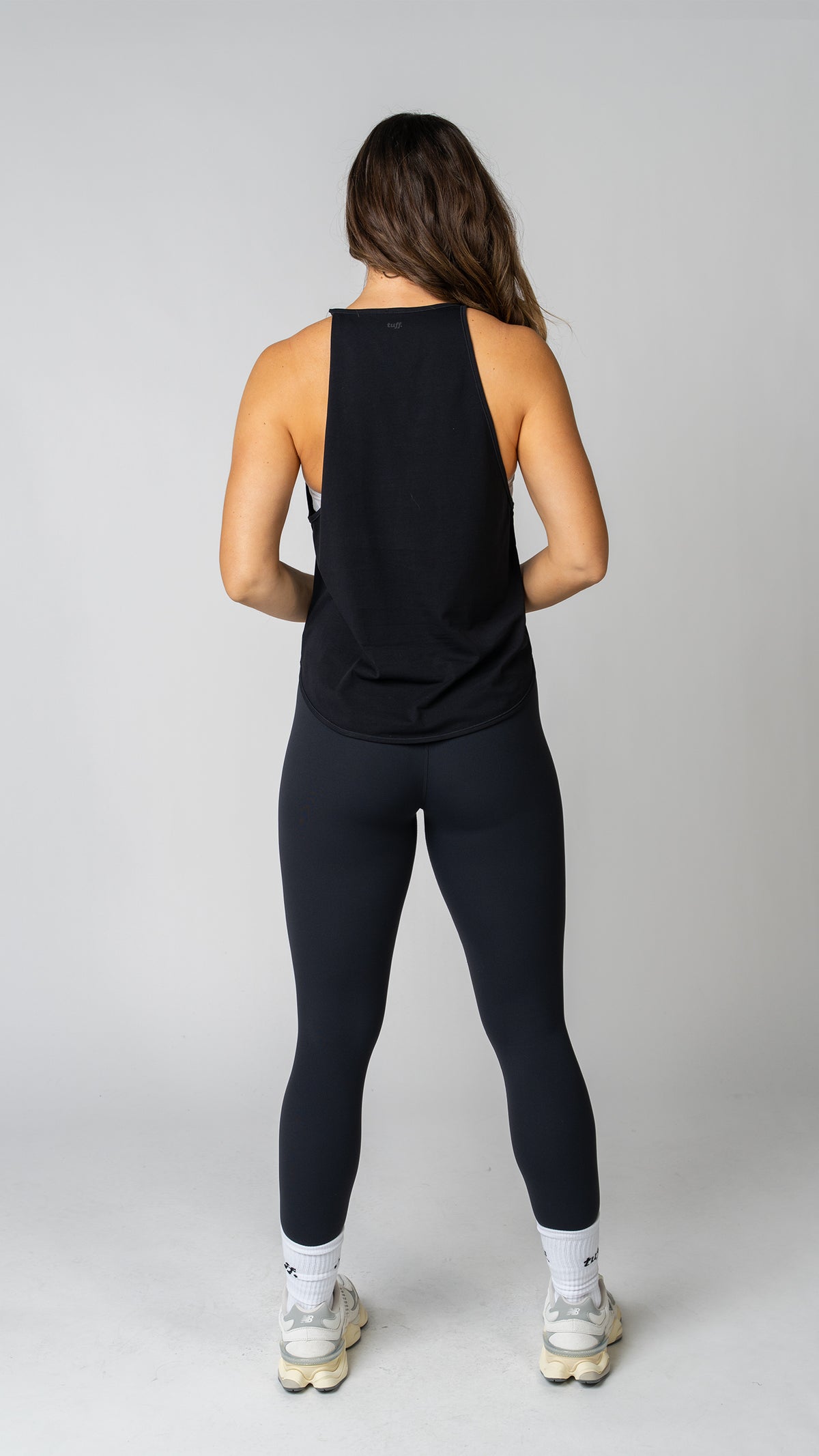 women wearing a black tank top