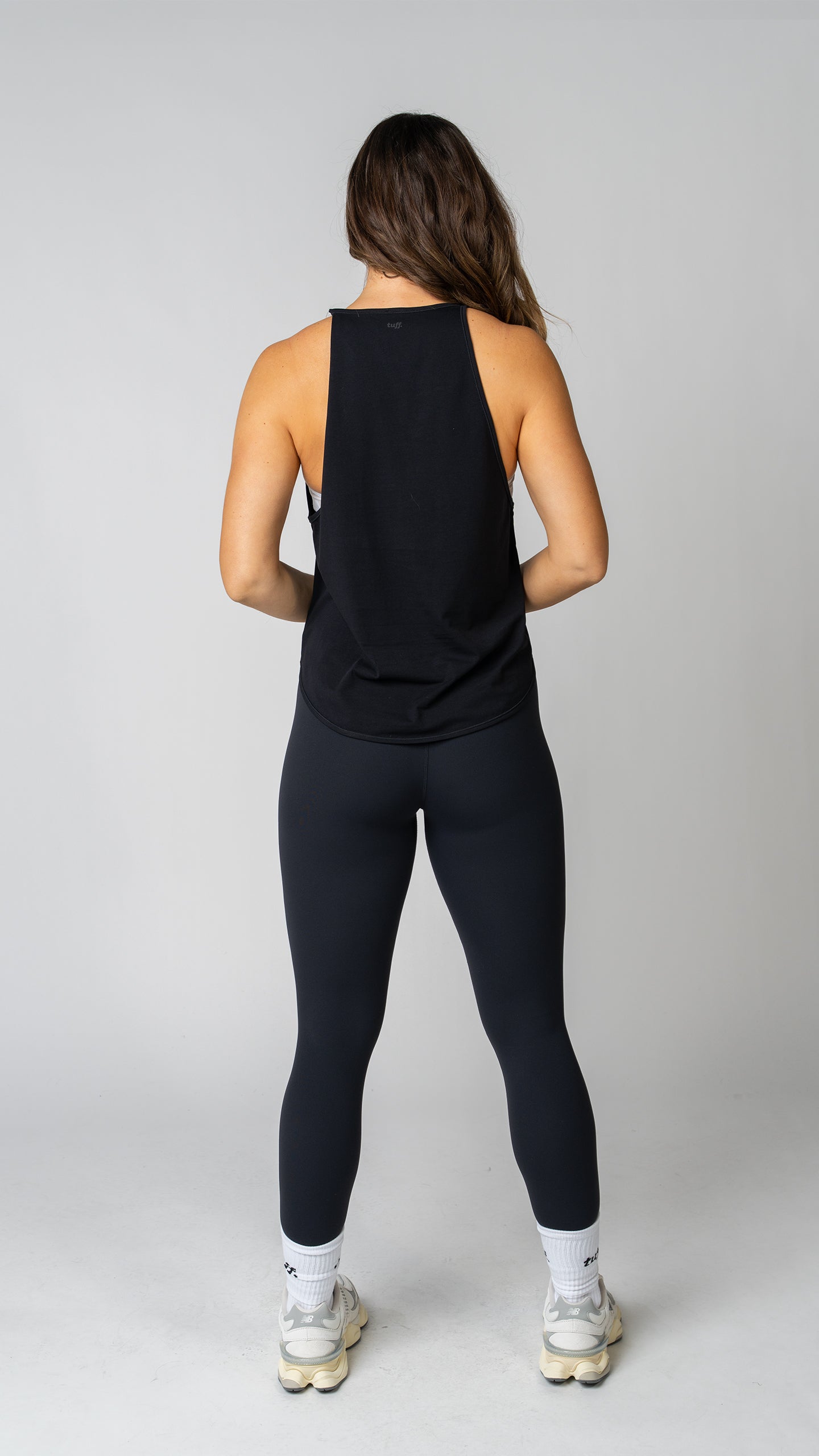 women wearing a black tank top