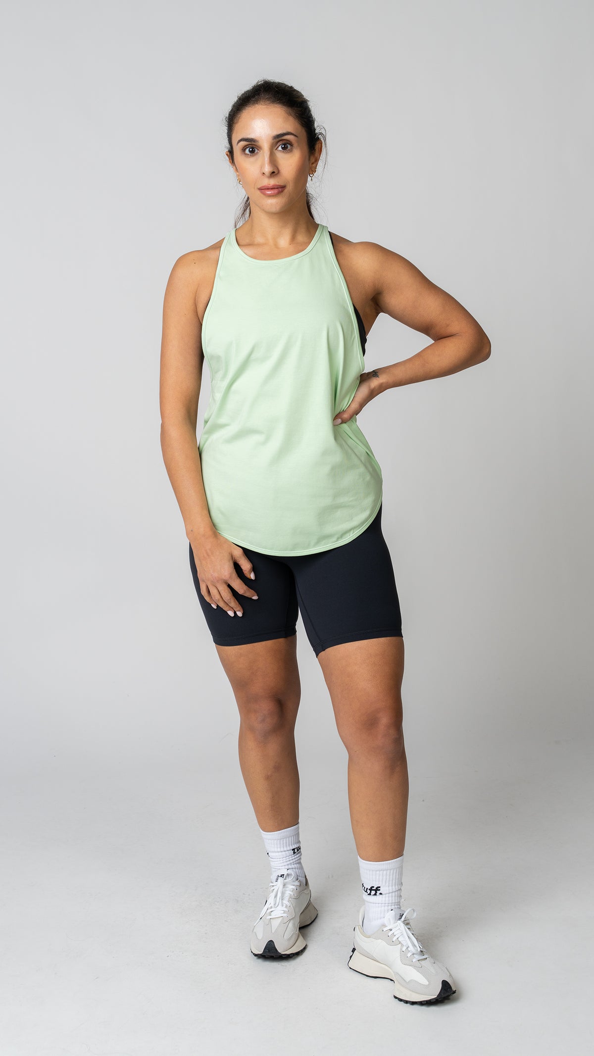 women wearing a green tank top