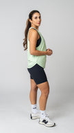 women wearing a green tank top