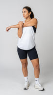 women in a white tank top