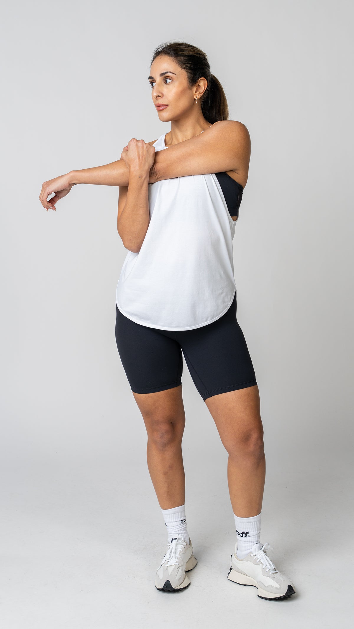 women in a white tank top