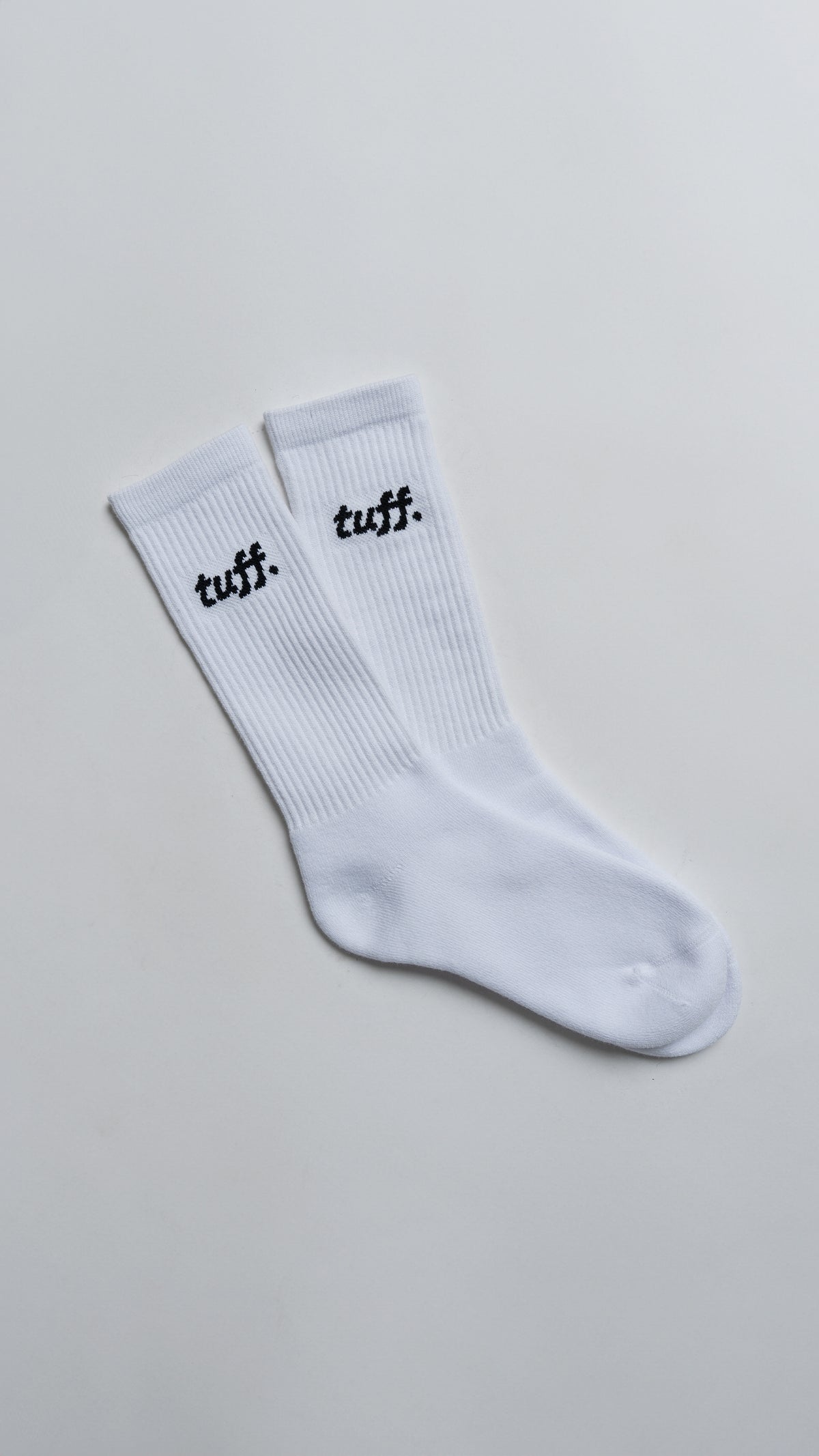 white socks with the Tuff logo.